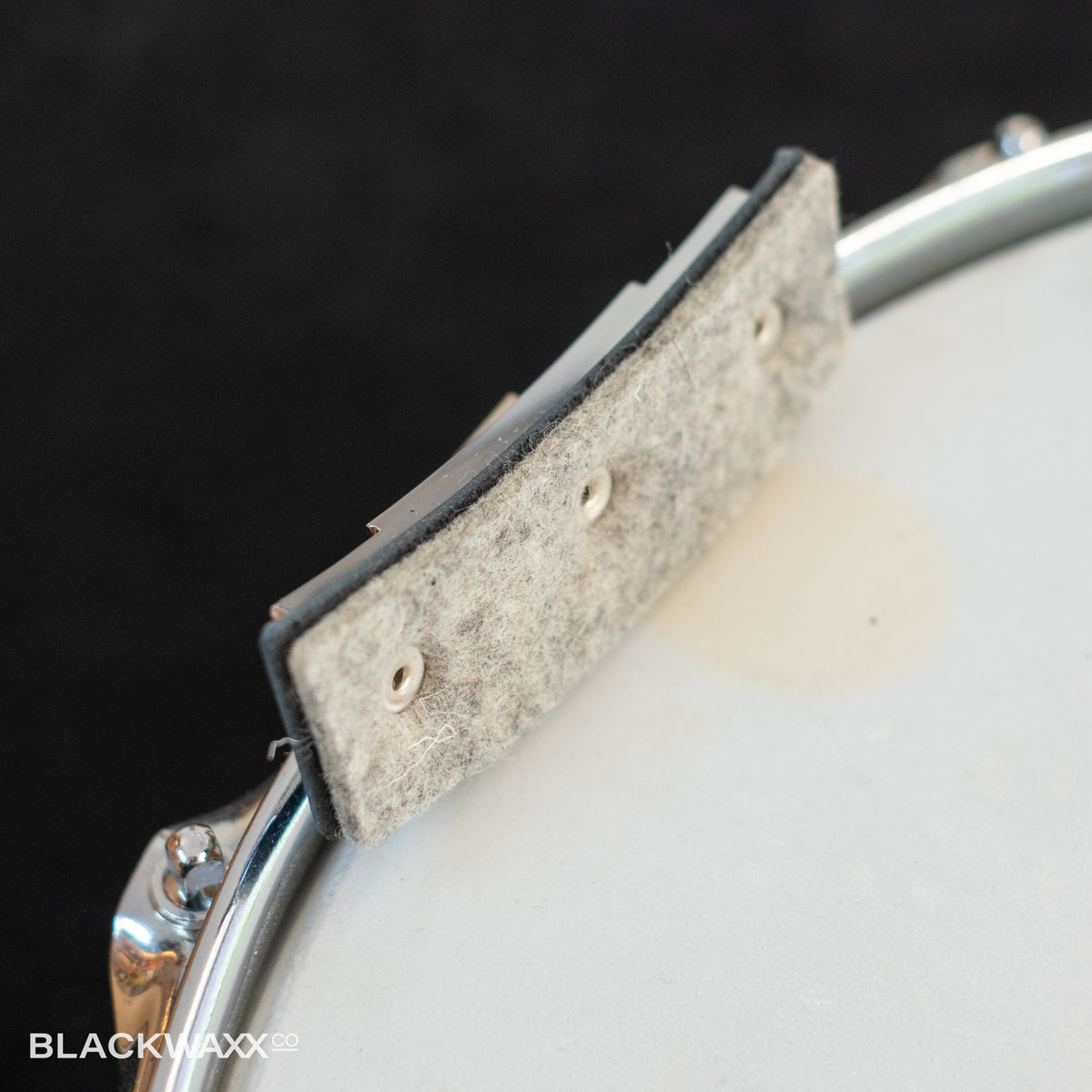 Snareweight M100 100g chrome and leather drum dampener