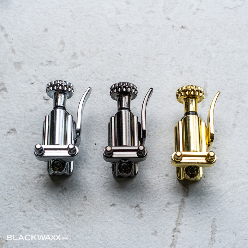 INDe Mini snare drum throw-off in chrome, black nickel and gold brass